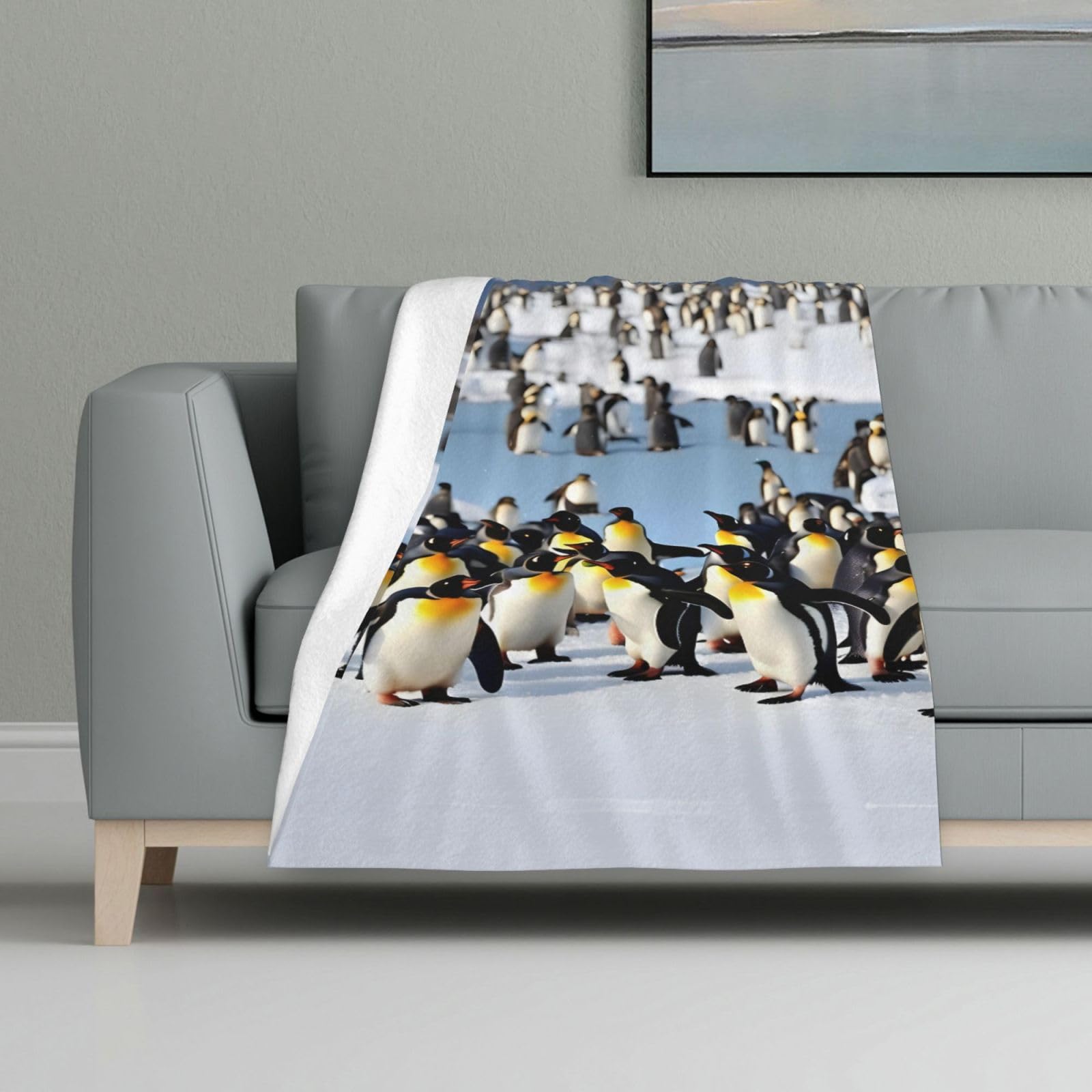 Couverture flanelle pingouin contre le froid du lit et canapé
