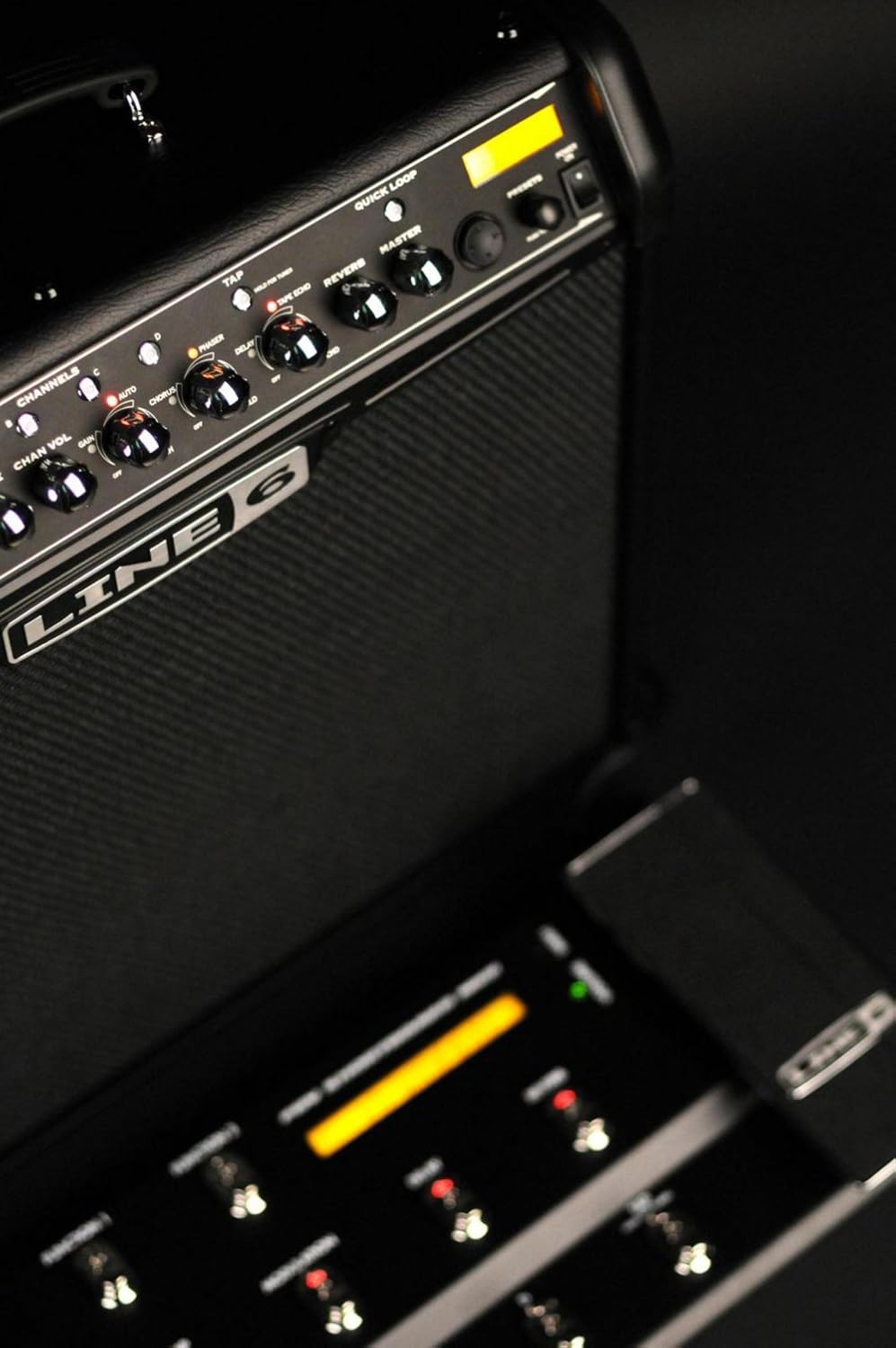 Front panel of the Line 6 Spider IV 75 amplifier showing input jacks and control knobs.