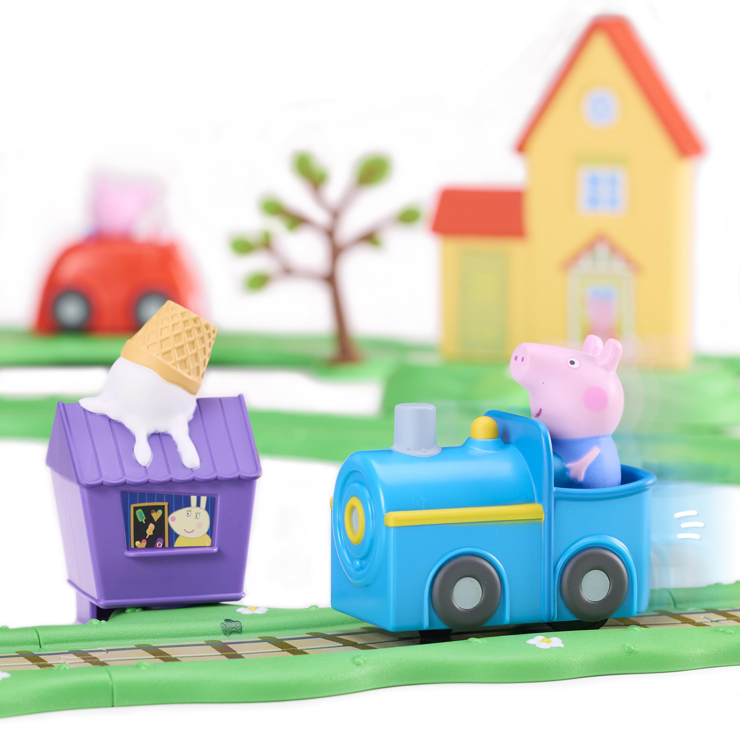 Peppa Pig Whizz-Around Città in movimento – Set di Gioco con Veicoli Motorizzati, Circuito Strada & Binari, Casa Elettronica con Suoni, Auto e Trenino, Accessori, Giocattolo dai 2 Anni in su