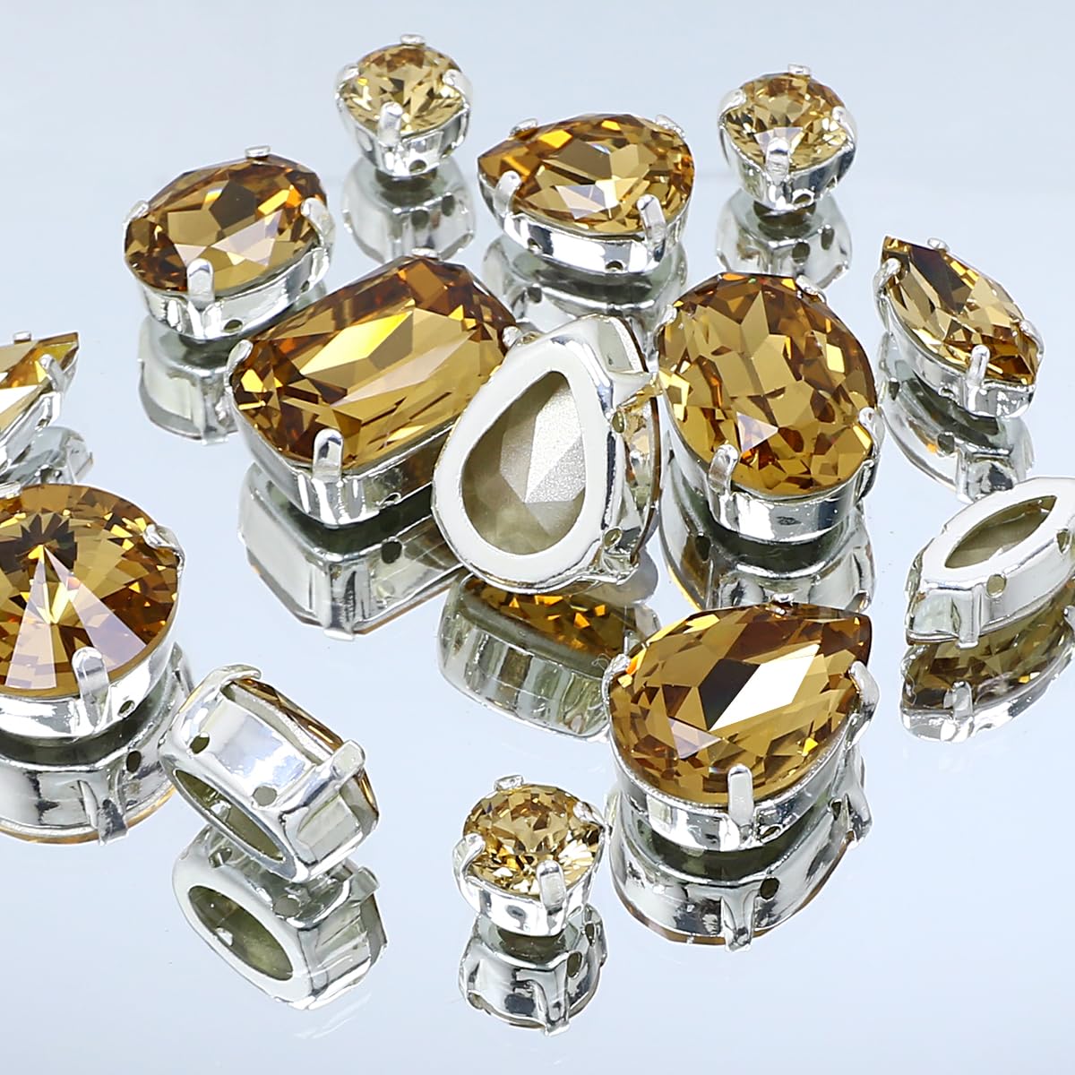 DONGZHOU Strass da cucire con artiglio d'argento, da cucire, con strass, per gioielli, fai da te, vestiti, scarpe, decorazione per matrimoni, 82 pezzi, topazio colorado chiaro