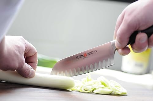 Vista 14 de Wusthof Classic Ikon cuchillo santoku con filo hueco, Negro