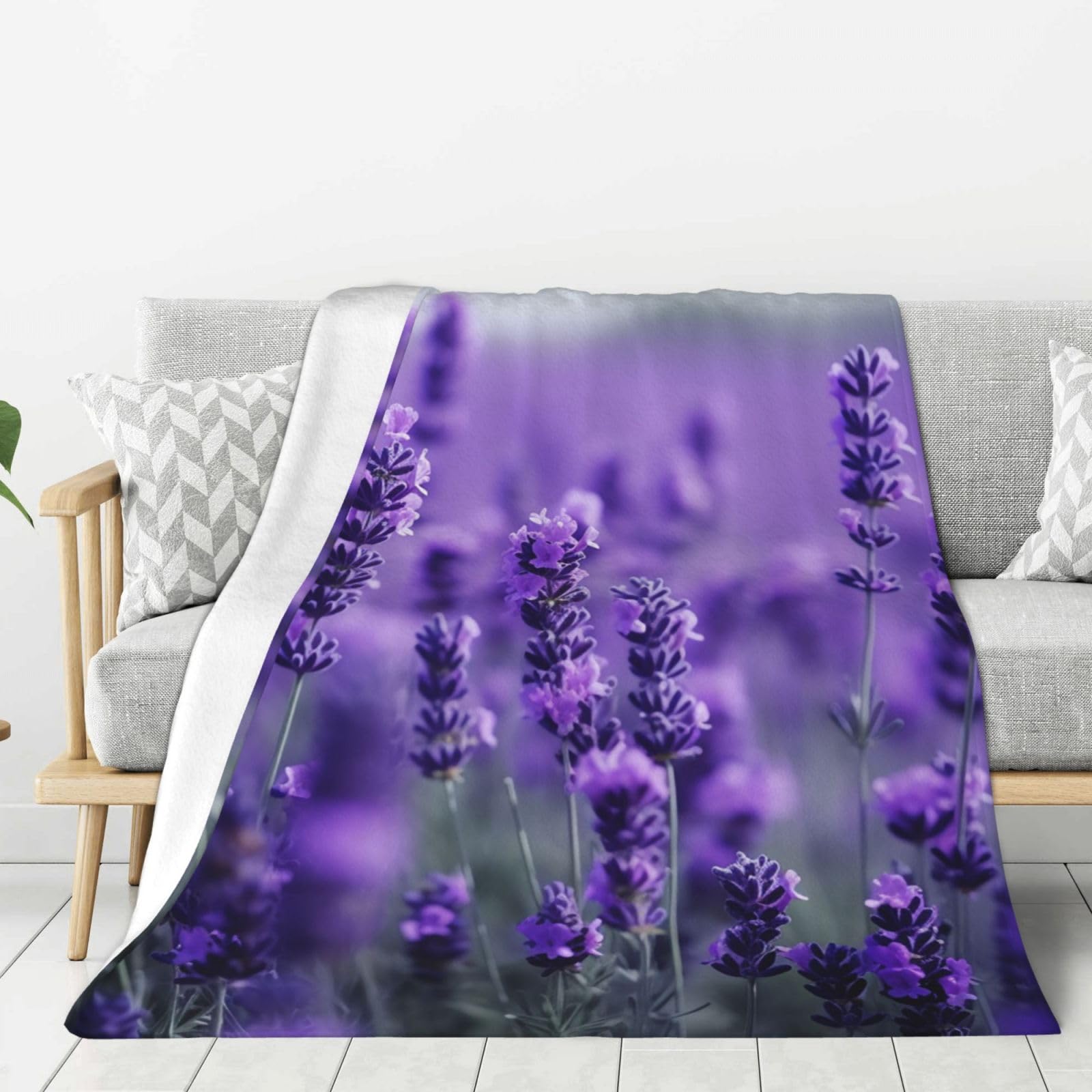 Couverture polaire en flanelle légère pour vos moments de détente sur le canapé ou en voyage