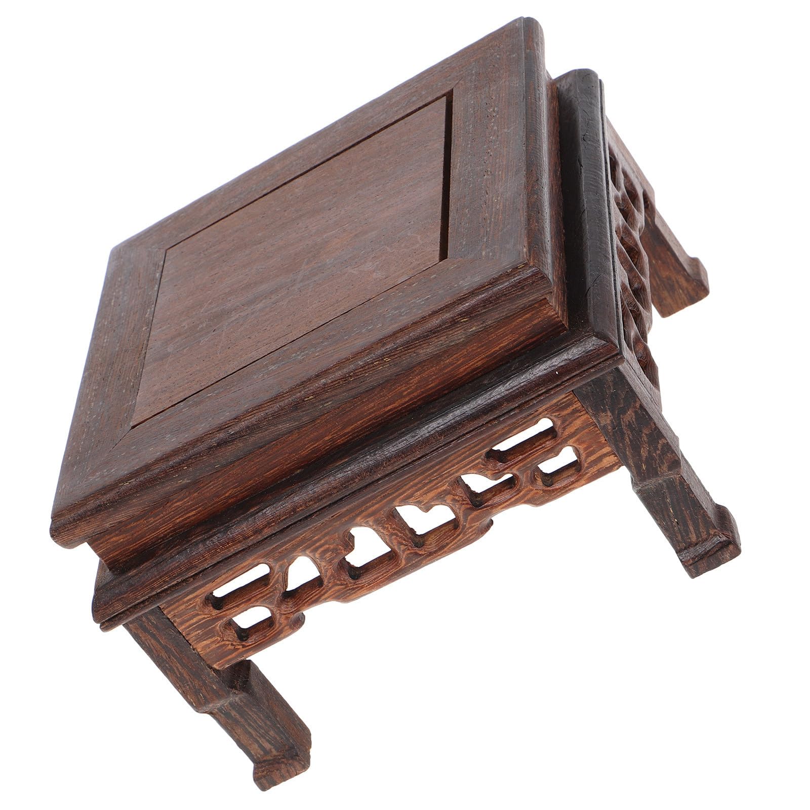 Soporte de madera rústica para jarrones decorativos en el escritorio de oficina