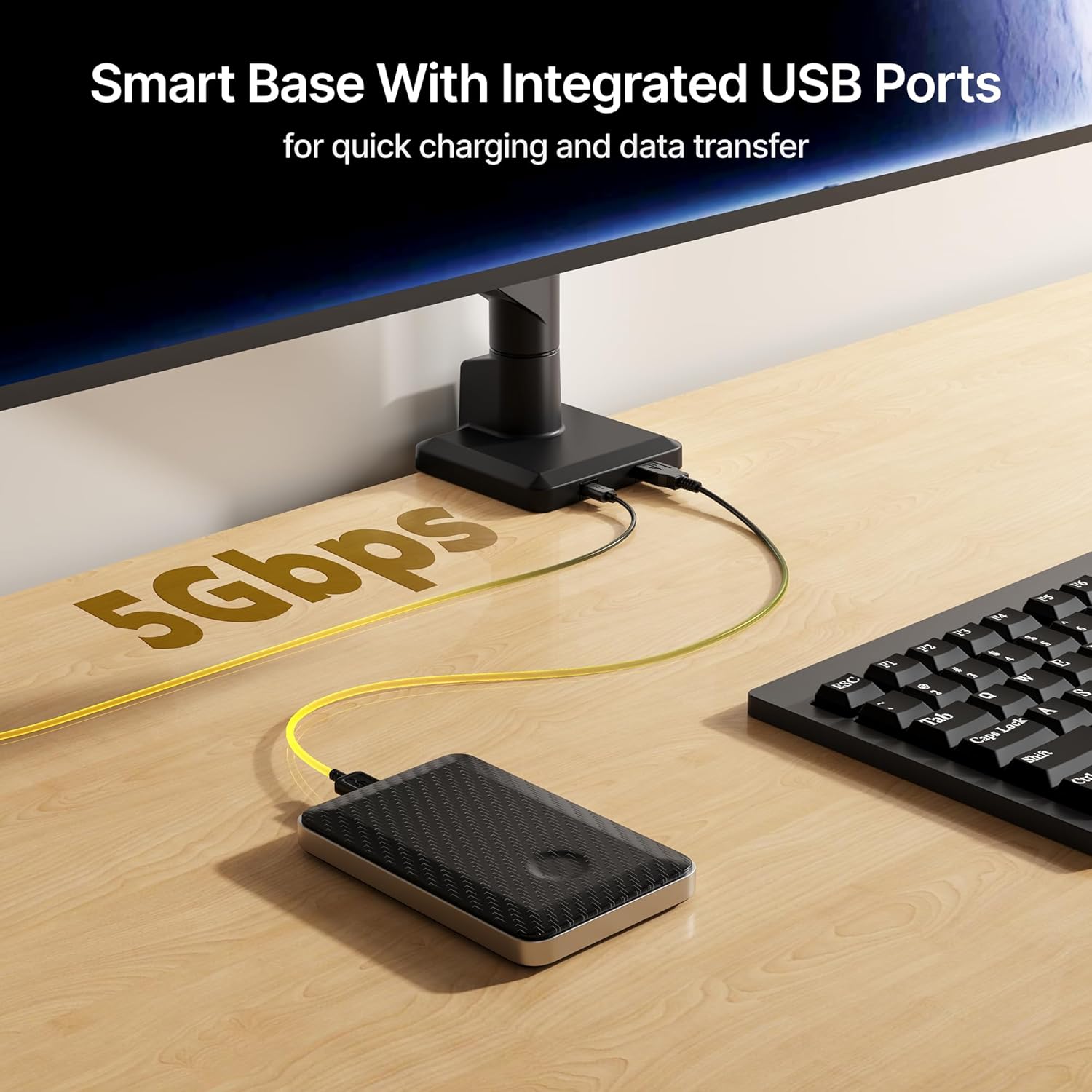 Close-up of the monitor arm's smart base with integrated USB ports, showing a device connected for charging/data transfer.