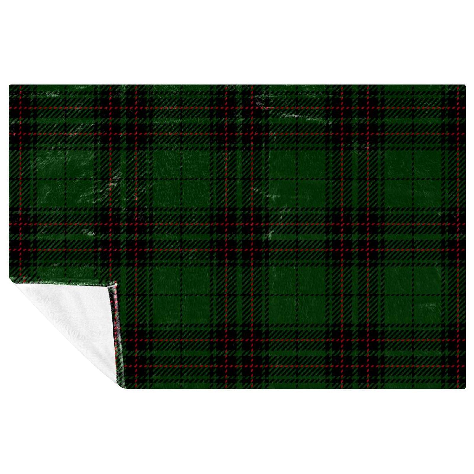 Plaid vert à carreaux chaud contre le froid sur votre canapé