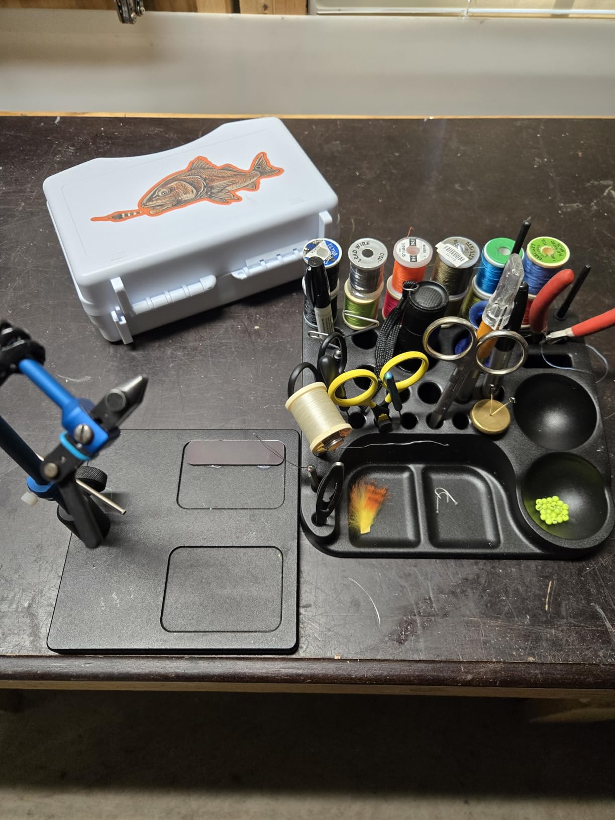 Kingfisher organizer top view showing bobbin slots and spool holders