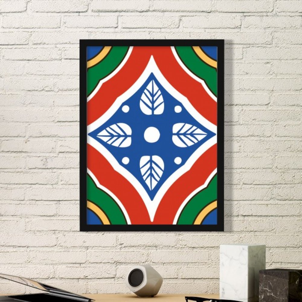 Peinture décorative Talavera pour rompre la monotonie des murs cadre en bois noir