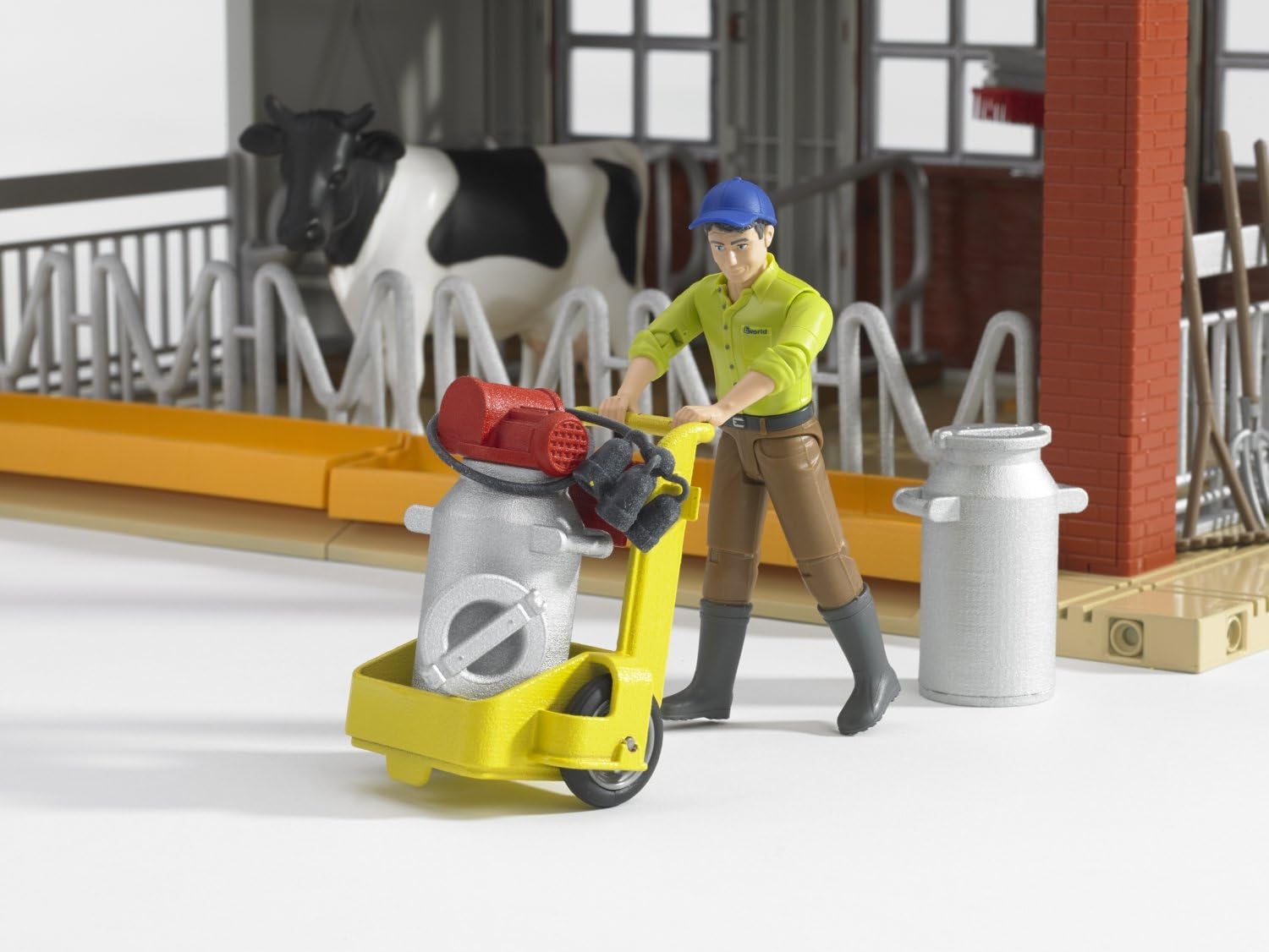 Close-up of farmer figure pushing the milking machine carriage