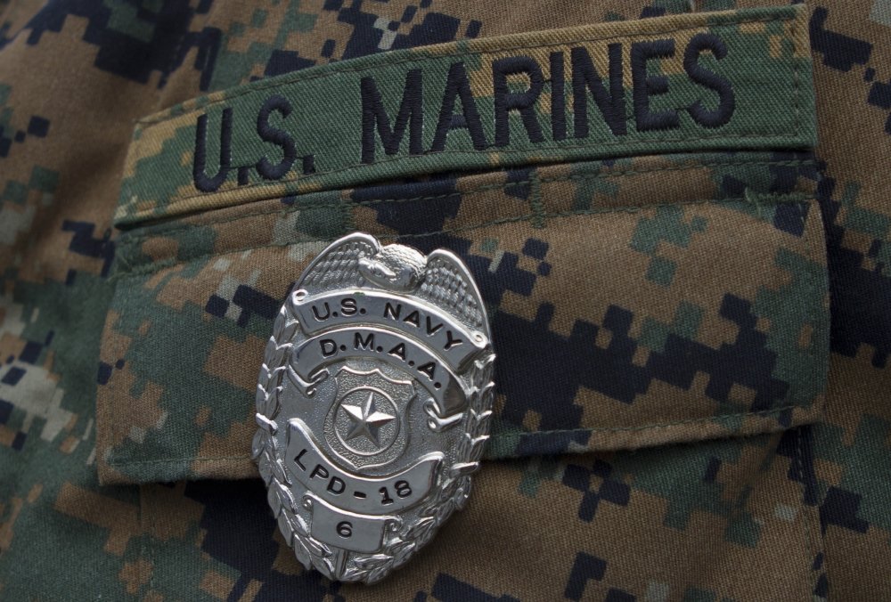 Amazon.com: Posterazzi Close-up of a duty master-at-arms badge on the  uniform of a U.S. Marine Poster Print, (34 x 23): Posters & Prints