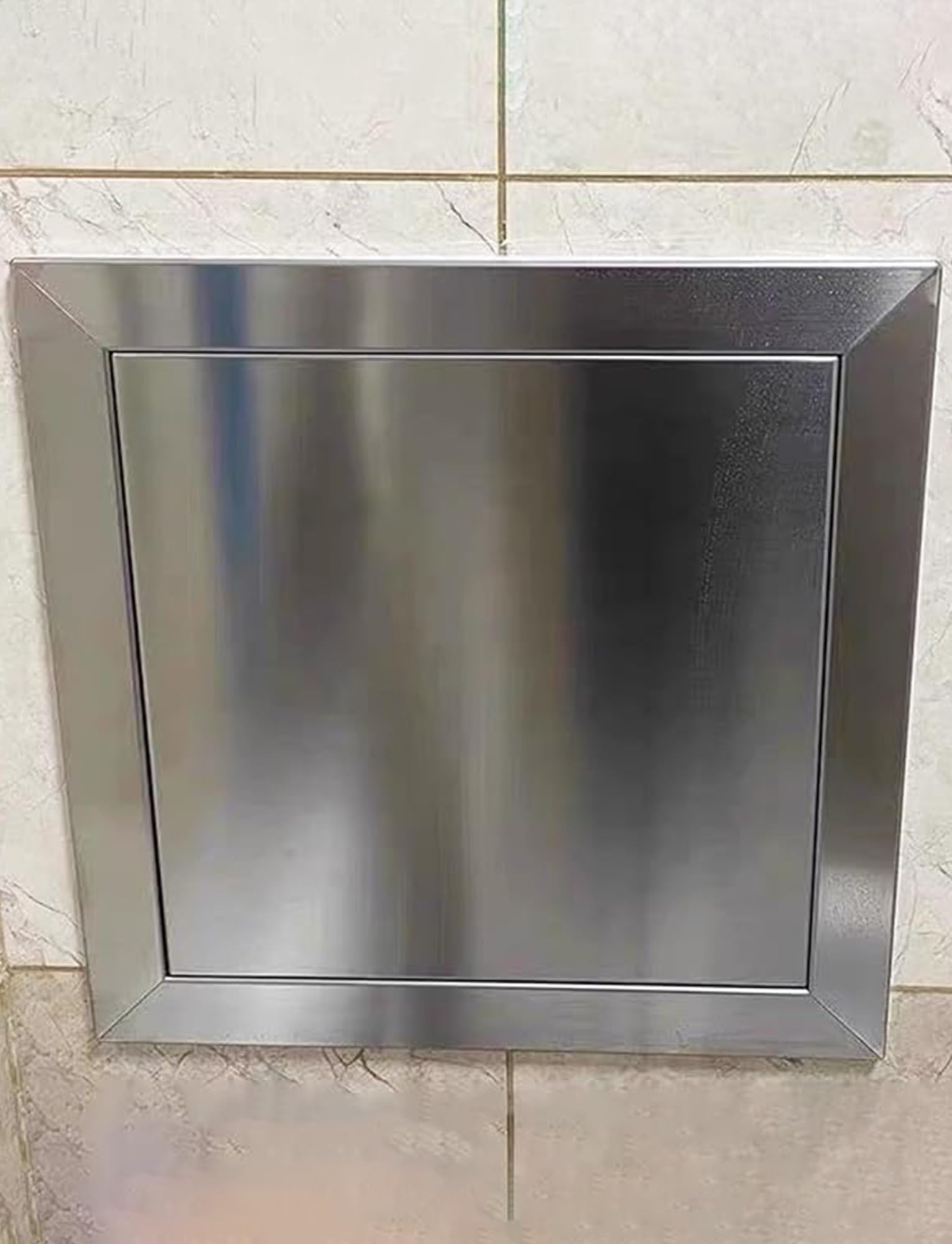 Trappe d'accès plomberie inox pour réussir l'aménagement de votre cuisine extérieure