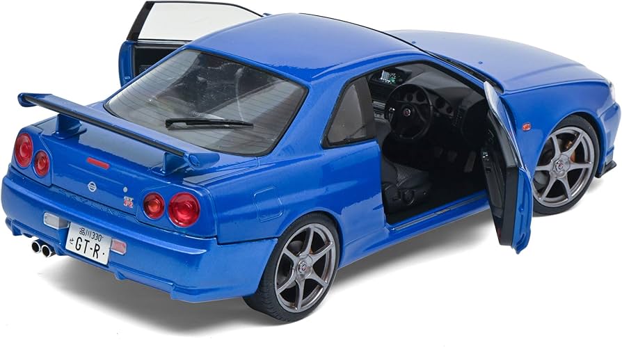 Amazon.com: Solido S1804301 1:18 Nissan GT-R (R34) -Bayside Blue