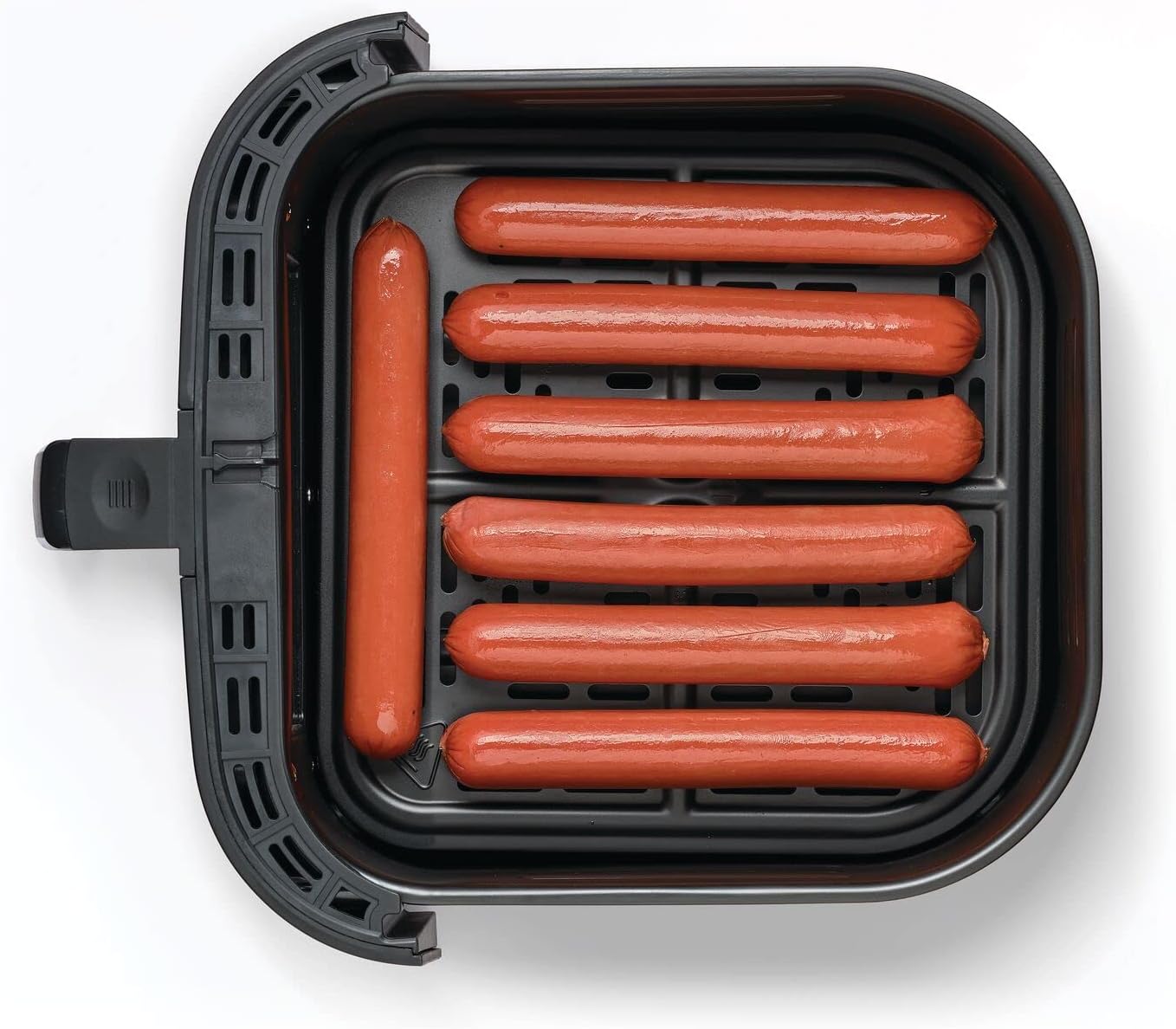Hot dogs arranged in the BLACK+DECKER AF5800 Air Fryer basket