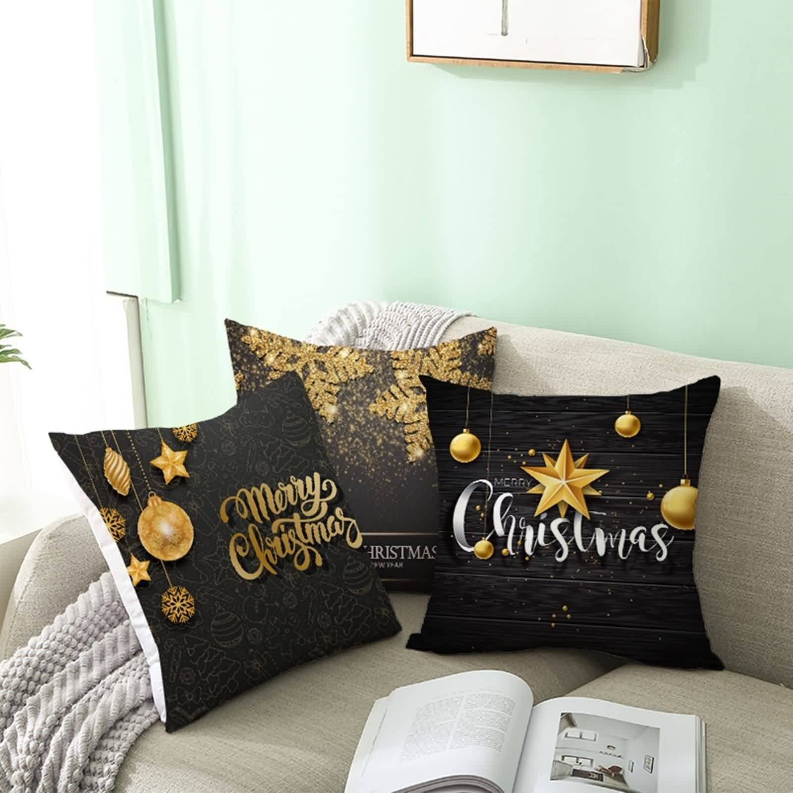 Set di 2 federe nere da 45x45 cm con stampa di piume e foglie argentate, perfette per decorare il divano o la camera da letto. | Leroy Merlin