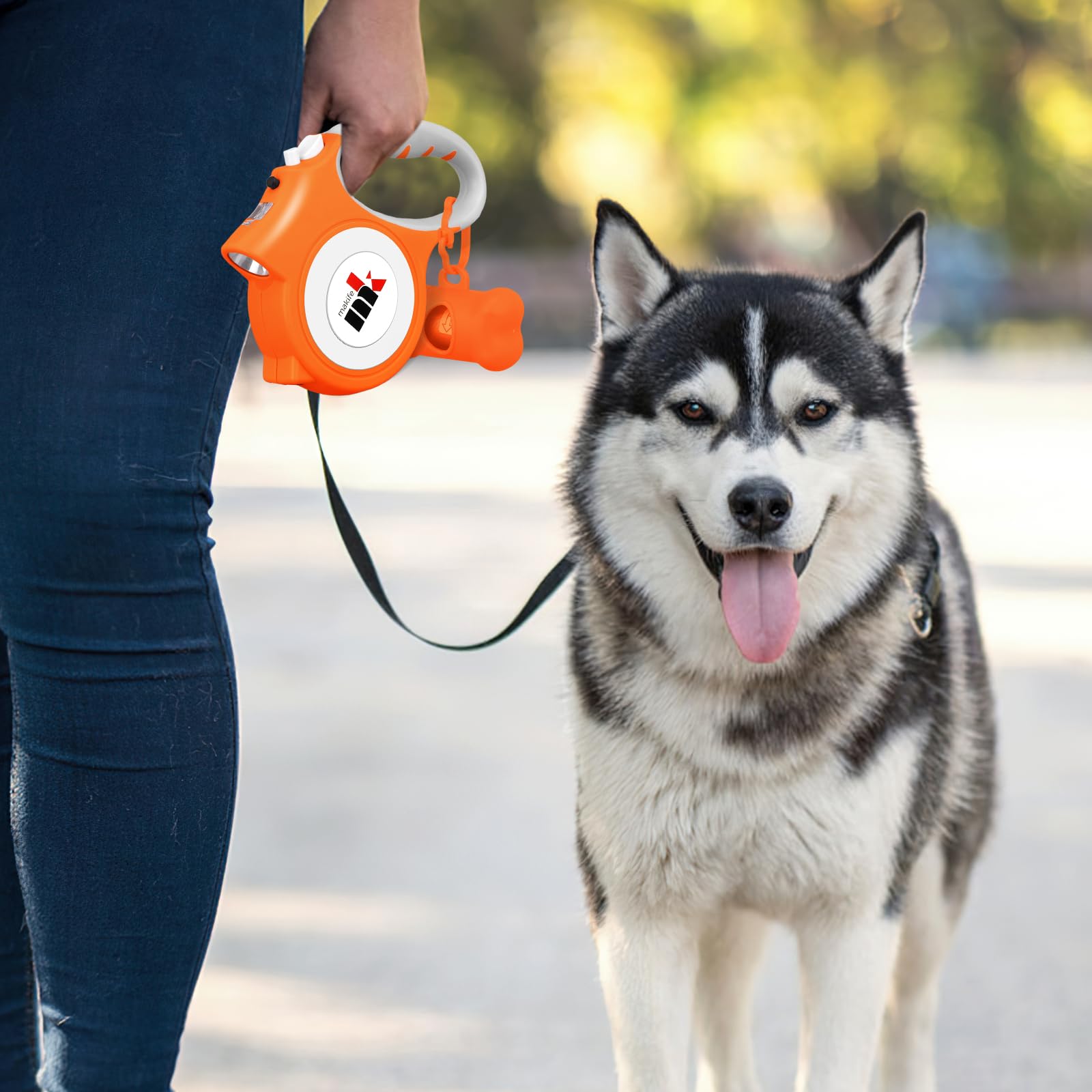 Guinzaglio retrattile per cani di piccola taglia fino a 25 kg, guinzaglio resistente da 5 m, con luce a LED e 15 sacchetti per escrementi per cani con dispenser, arancione