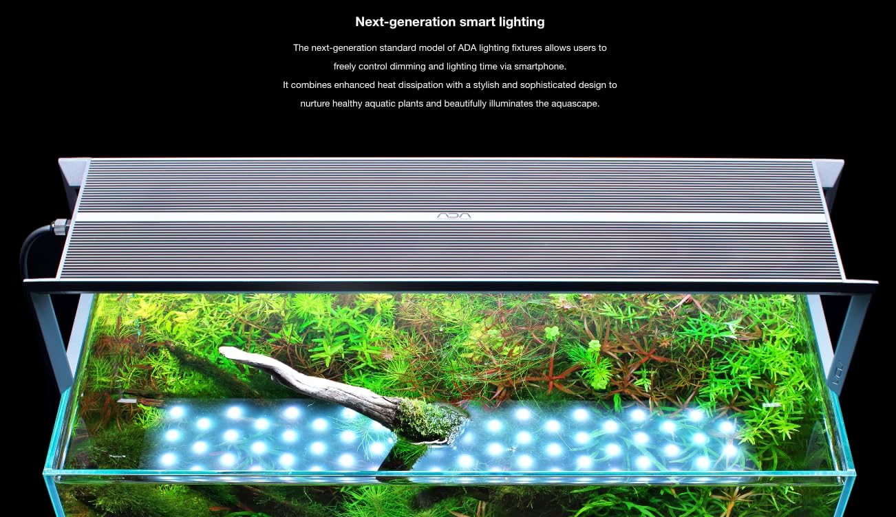 The AQUASKY RGB II 60 light fixture positioned over a planted aquarium, showcasing its sleek design and how it illuminates the aquatic environment.