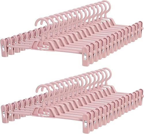 POZEAN - Paquete de 30 perchas para pantalones con clips, perchas de plástico apilables para faldas, perchas para ropa con clips giratorios y