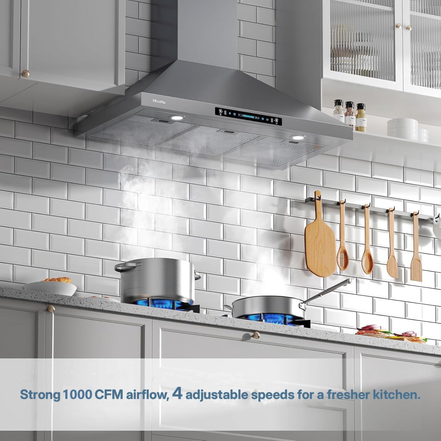 Range hood in kitchen with steam being extracted