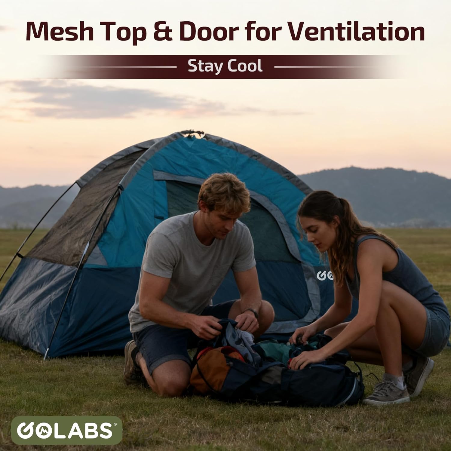 A person organizing gear outside the Golabs CT1 tent, highlighting the mesh door and top for ventilation.