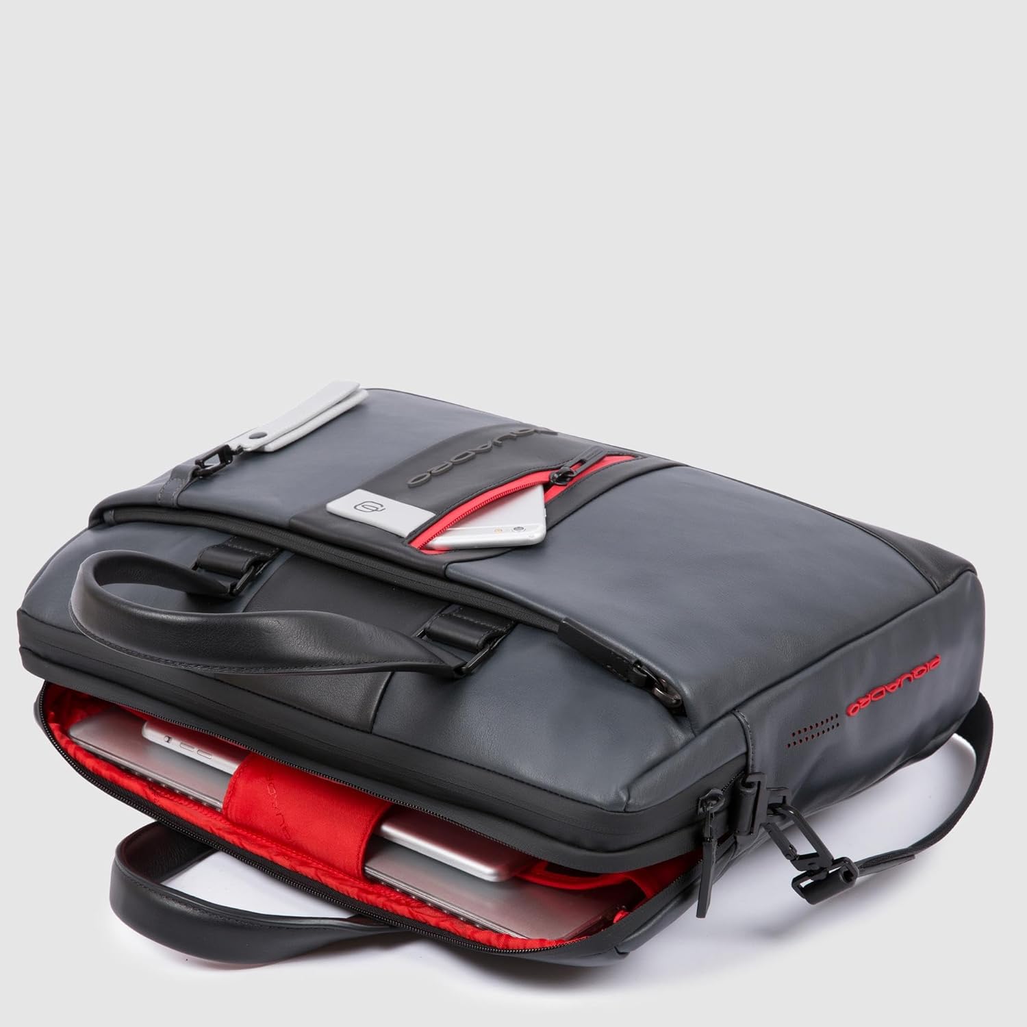 Personalizable leather laptop bag with iPad® compartment. 2 dividers and shock absorbing protection