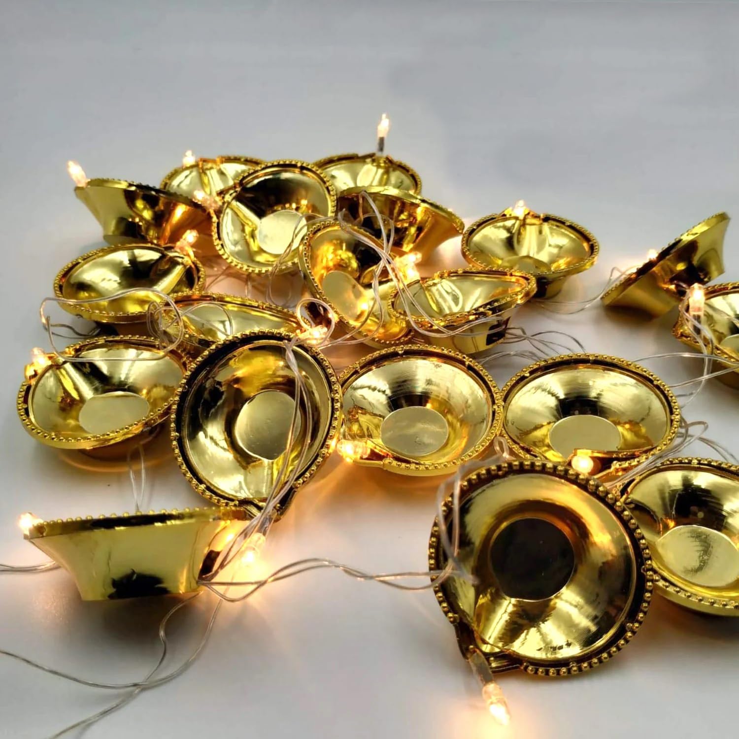 See full amazon price history chart for MAPPERZ Golden Wire Diya String Light PVC Golden Diya Led Deepak Fairy String Series Lights for Home Decoration Plug-in Flameless, Smokeless Diwali Diya (Warm White) Pack of 1 MAPPERZ Golden Wire Diya String Light PVC Golden Diya Led Deepak Fairy String Series Lights for Home Decoration Plug-in Flameless, Smokeless Diwali Diya (Warm White) Pack of 1 (B0DFWXMKYG) Amazon Price History, Amazon Price Tracker