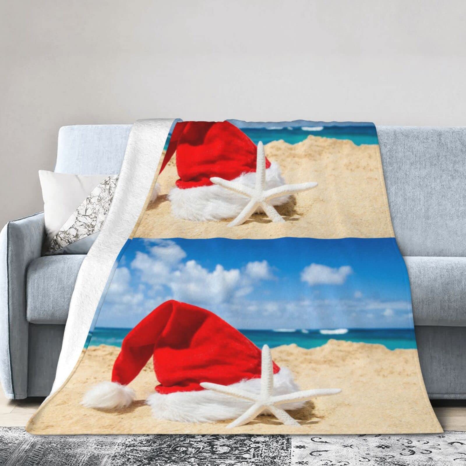 Couverture en flanelle cadeau original avec motif Père Noël plage et étoile de mer