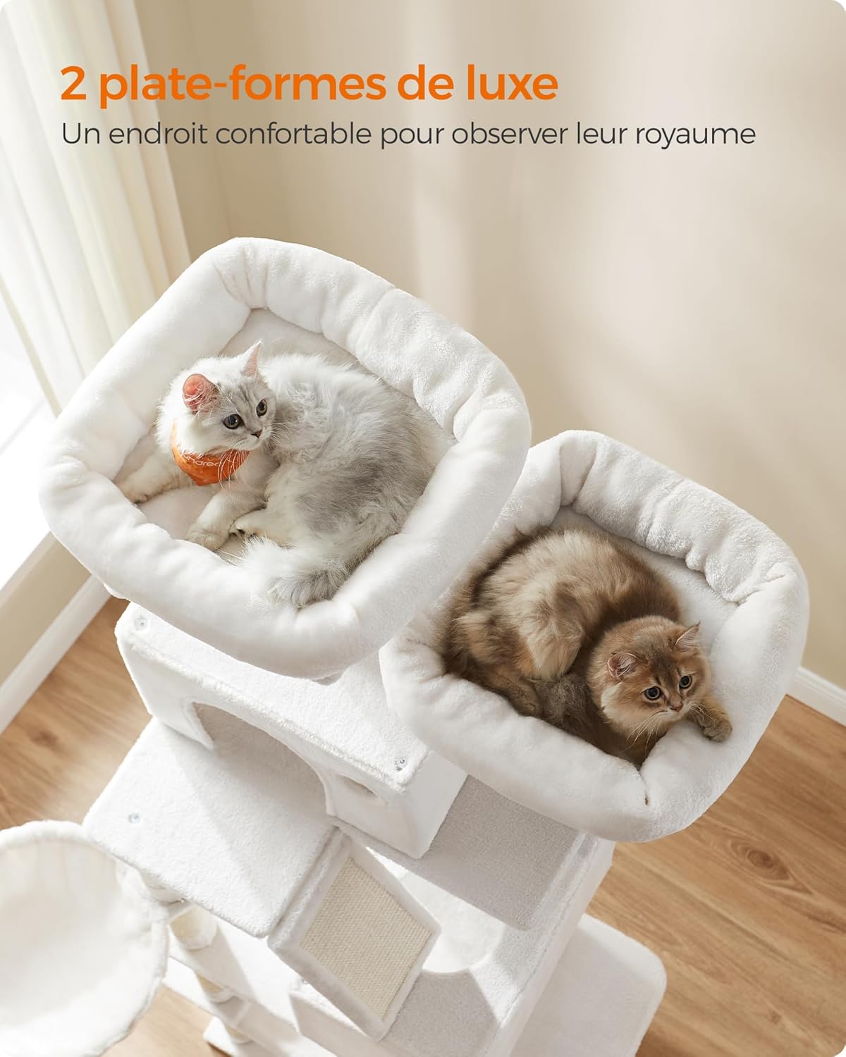 Two cats resting comfortably on the plush, padded platforms of the cat tree.