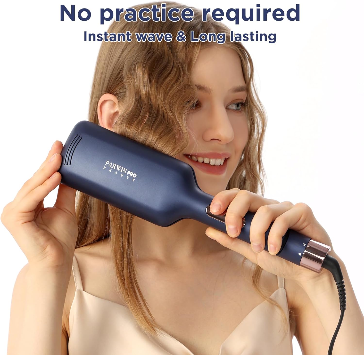 Woman using the hair waver to create waves