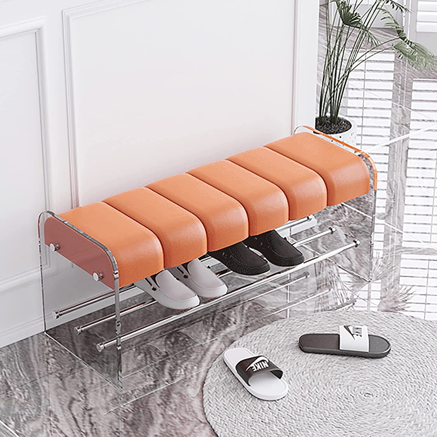 Banco para dormitorio y pie de cama en cuero naranja con zapatero elegante