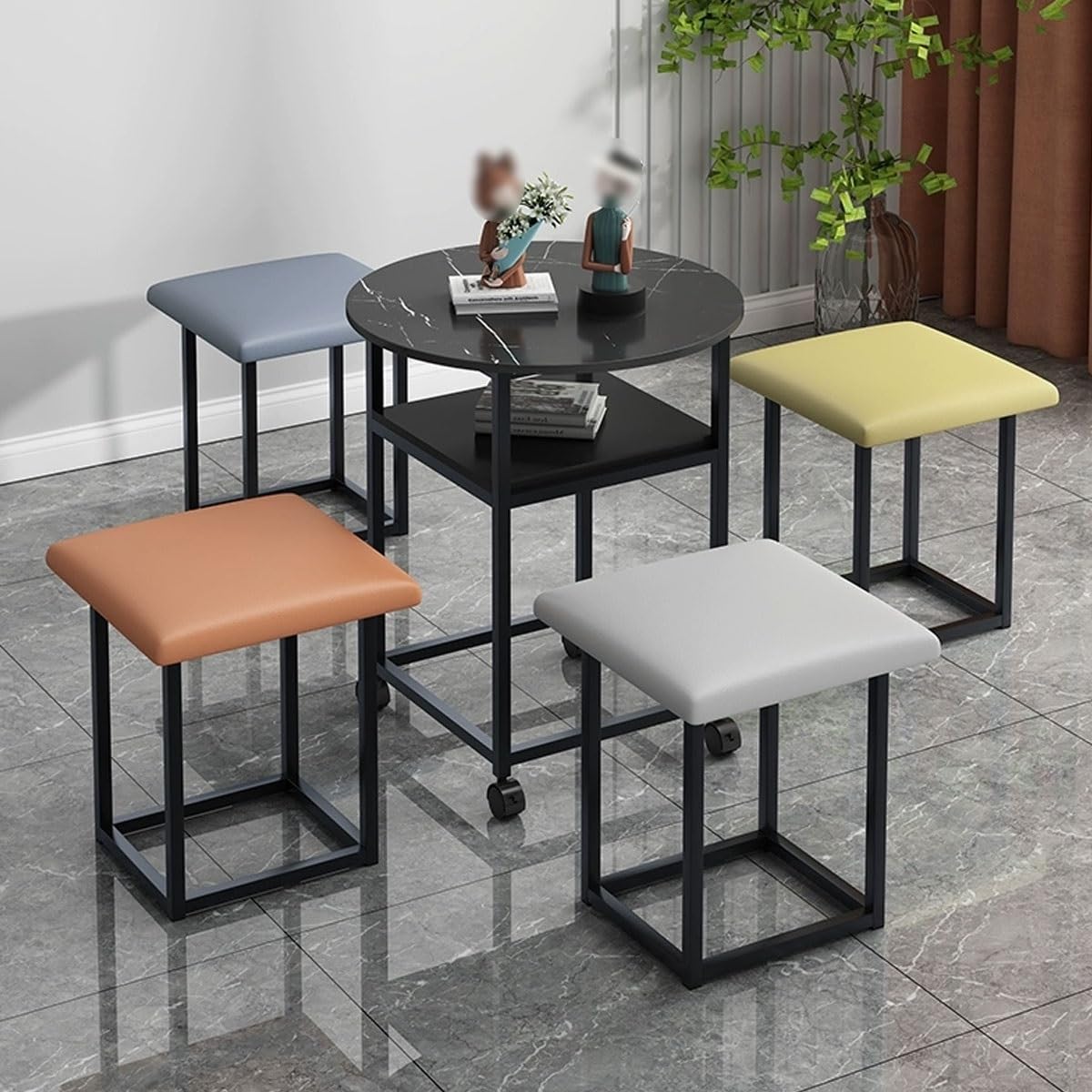 Table basse ronde et 4 tabourets en simili cuir noir encastrables