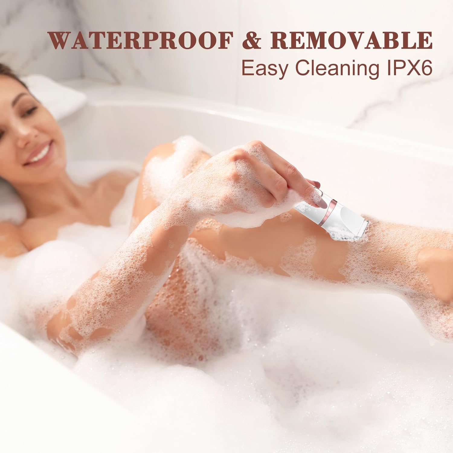 Woman using the MAXGROOM electric shaver in a bubble bath, highlighting its waterproof design