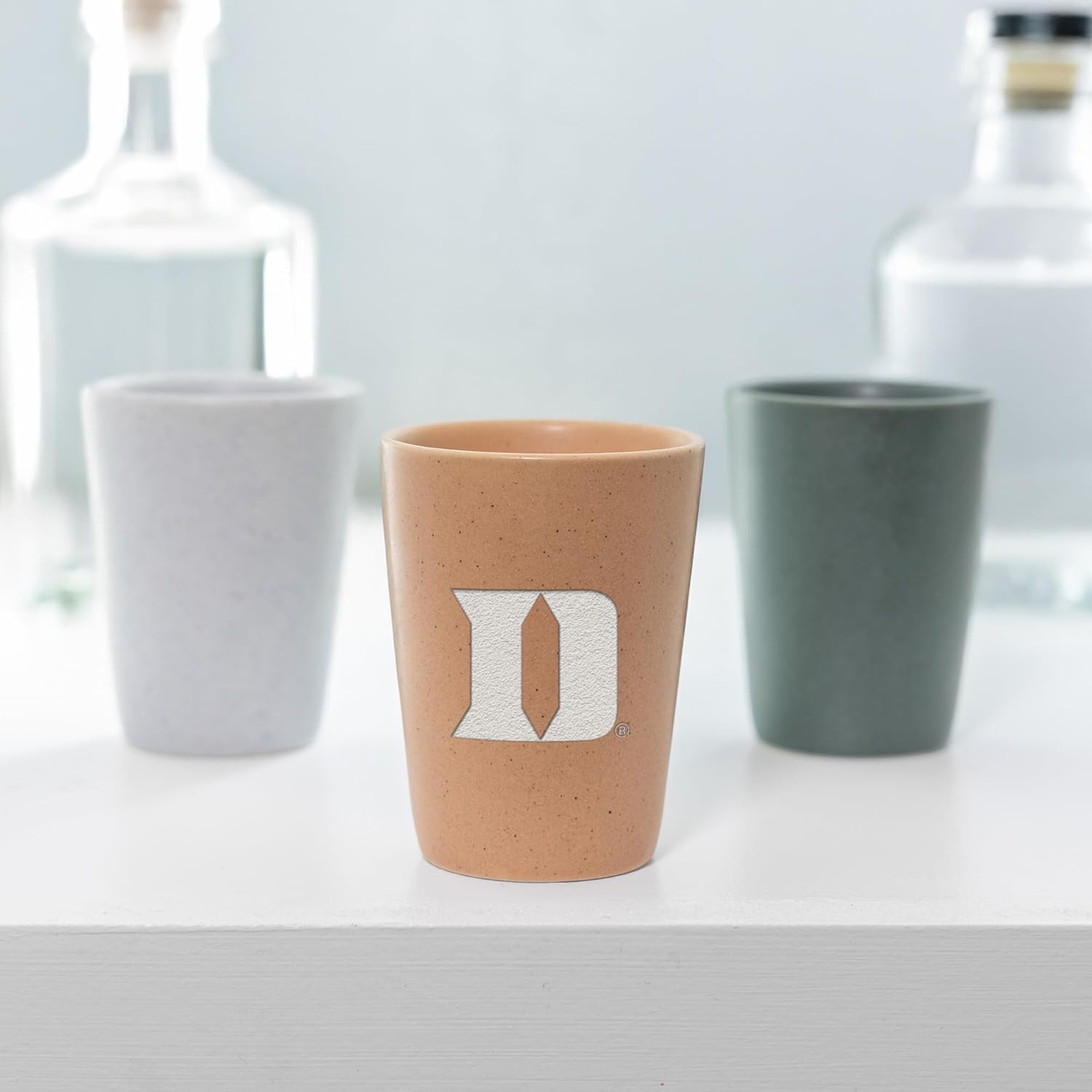 Rico Industries NCAA Duke Blue Devils Sand 2oz Ceramic Shot Glass for Fans, Laser Engraved In Trendy Color Single Shot Glass - Image 4