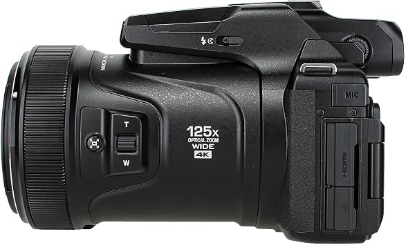 Nikon COOLPIX P1100 125x Super Zoom Compact Digital Camera (26541) + Photo Software + 2 x 64GB Memory Card + Lens Filter Kit + Camera Bag + EN-EL20 + Charger + Flexible Tripod + More