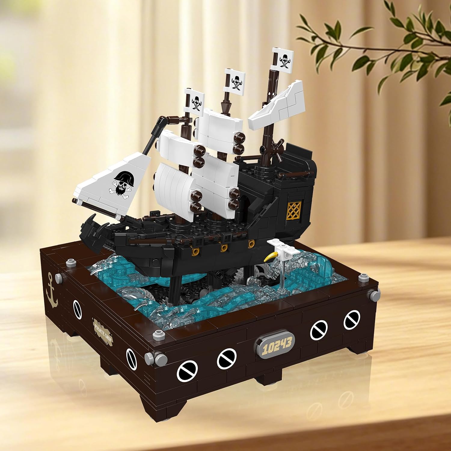 Mould King 10243 Dynamic Pirate Ship Model Kit on a desk