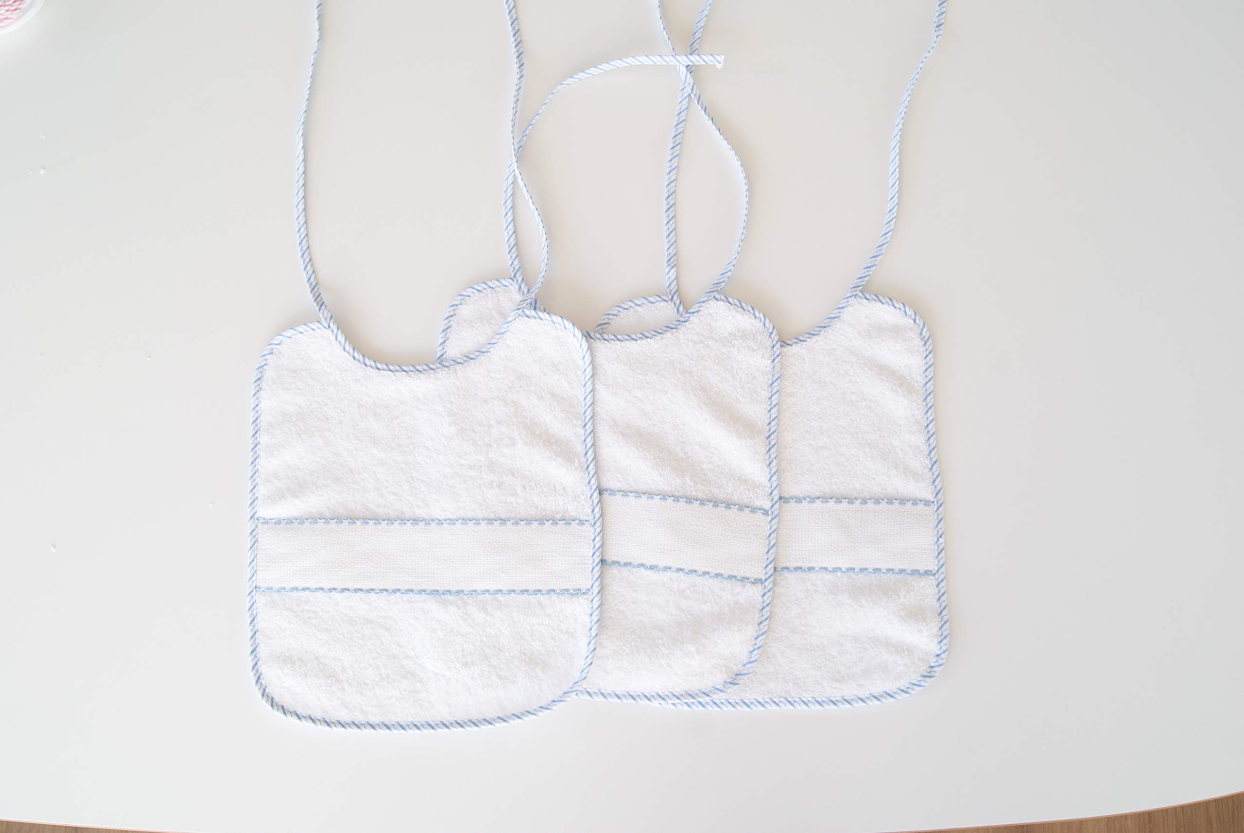 Interbaby 00042 - Pack de 12 baberos de punto de cruz 20x25, unisex