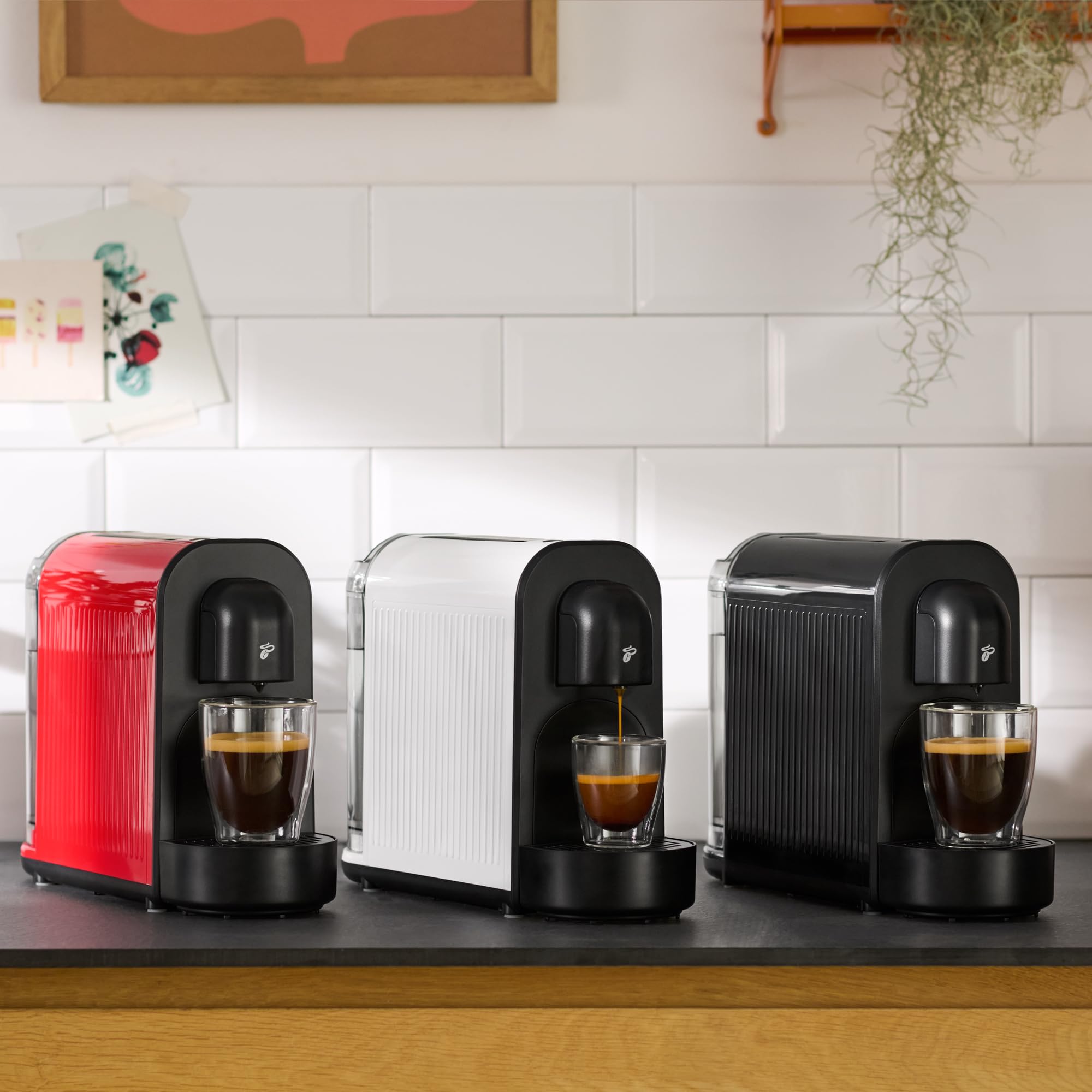 Tchibo Cafissimo NOW Kaffeemaschine Kapselmaschine für Caffè Crema, Espresso und Kaffee | 0,67 l | 1250 Watt | 11,4 x 33,7 x 23,5 cm | Schwarz