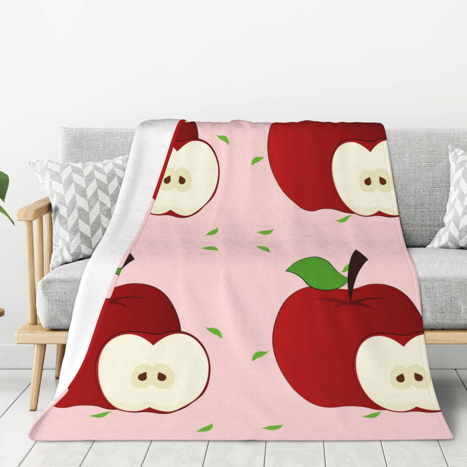 Couverture flanelle chaude pour soirées cocooning canapé pommes