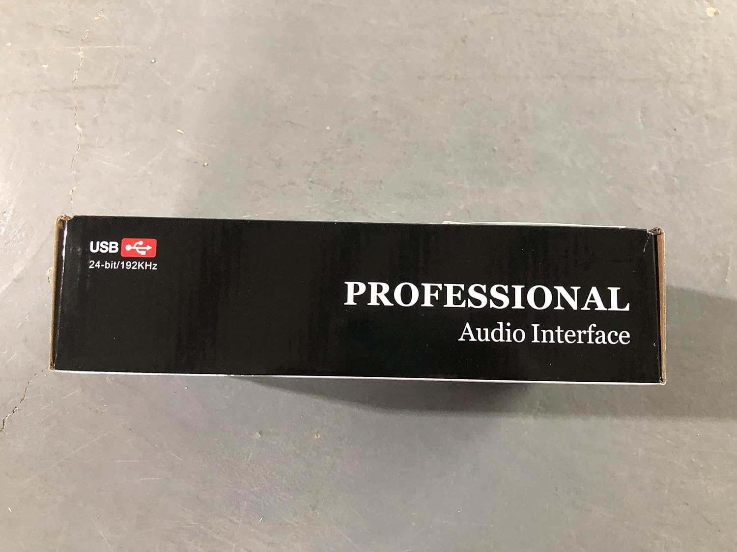 Close-up of the rear panel of the Depusheng RX2 showing the 5VDC Type-C power input with a cable connected