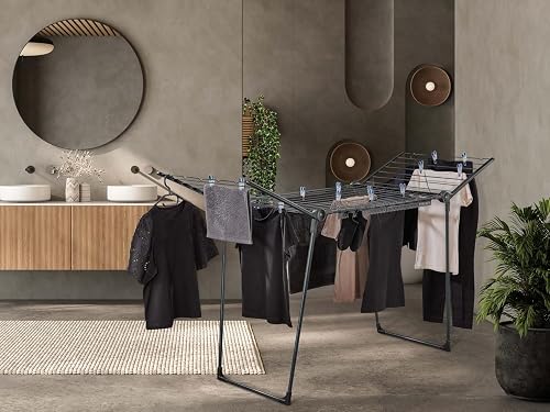 Leifheit Séchoir à Linge Pegasus 200 Solid Black, Étendoir à Linge Noir avec Ailes pour Les vêtements Longs, Séchoir sur Pied Stable pour intérieur et extérieur, Étendoir Linge au Design Moderne - 4