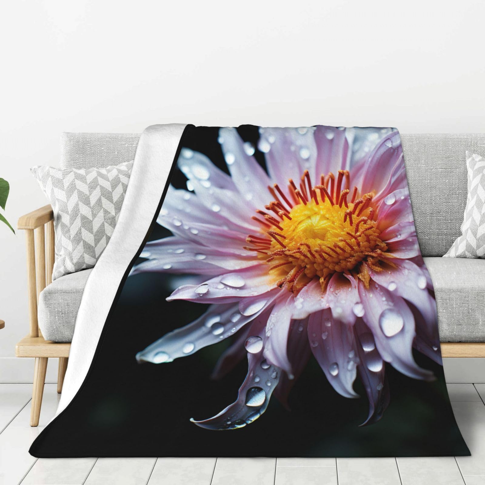 Couverture en flanelle à fleurs pour vos soirées cocooning sur le canapé