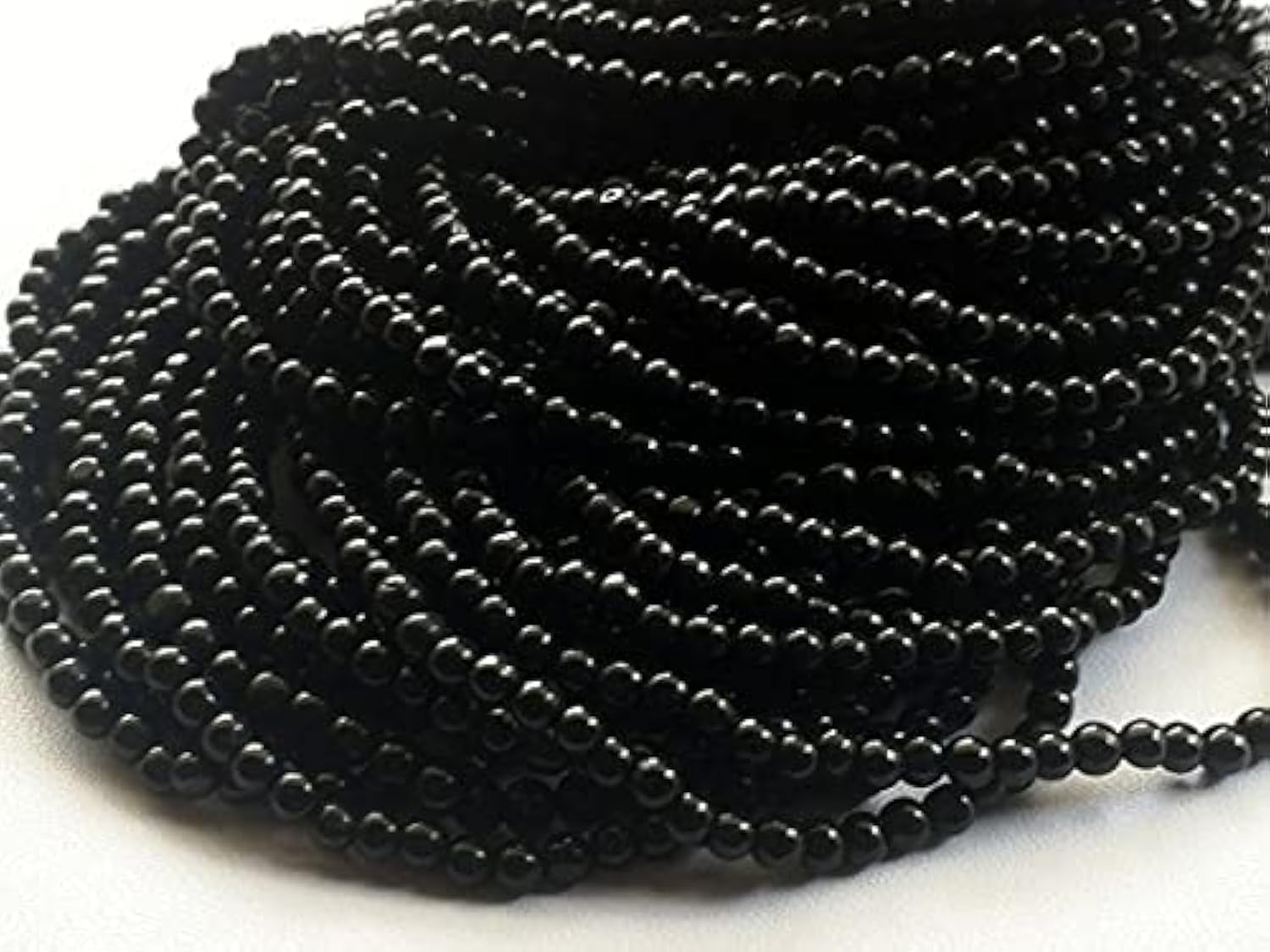 Tourmaline noire naturelle 6.5mm contre les ondes négatives en collier de perles lisses