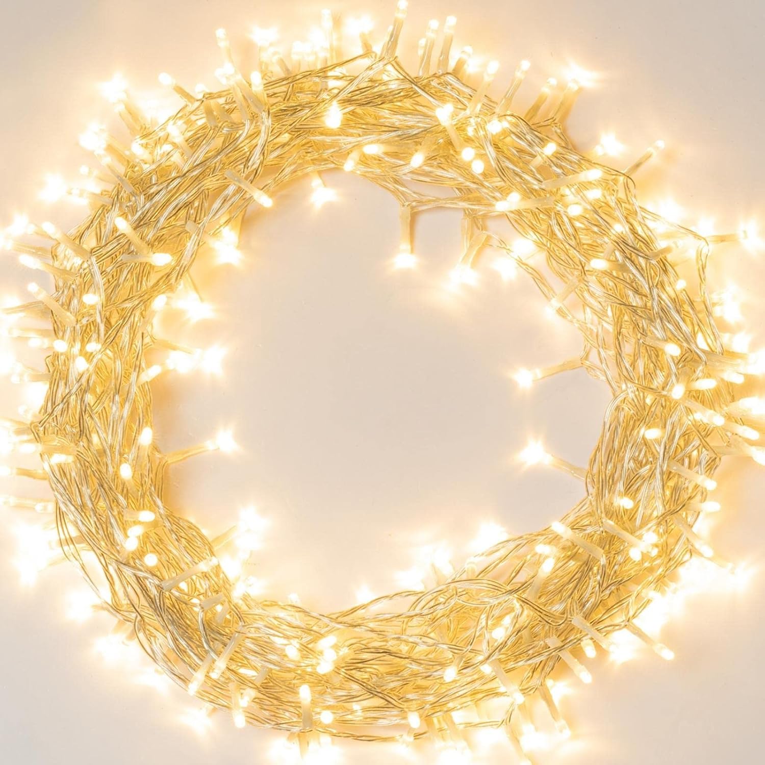Coiled warm white LED string lights glowing brightly