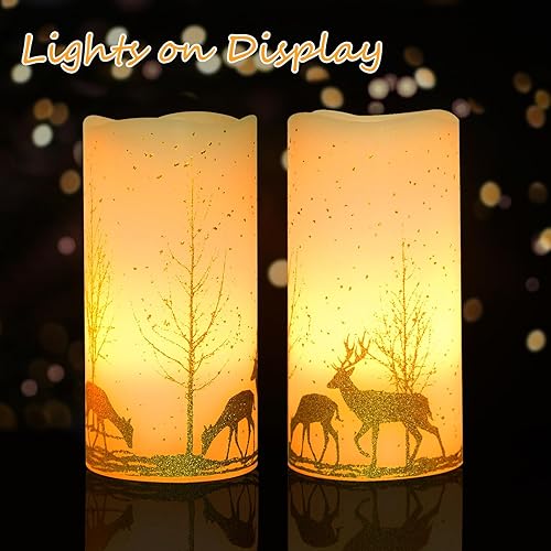 Miniatura 7 de Paquete de 2 velas LED parpadeantes sin llama, velas de cera a pilas con temporizador remoto, velas de pilar sin llama con calcomanía de ciervo del
