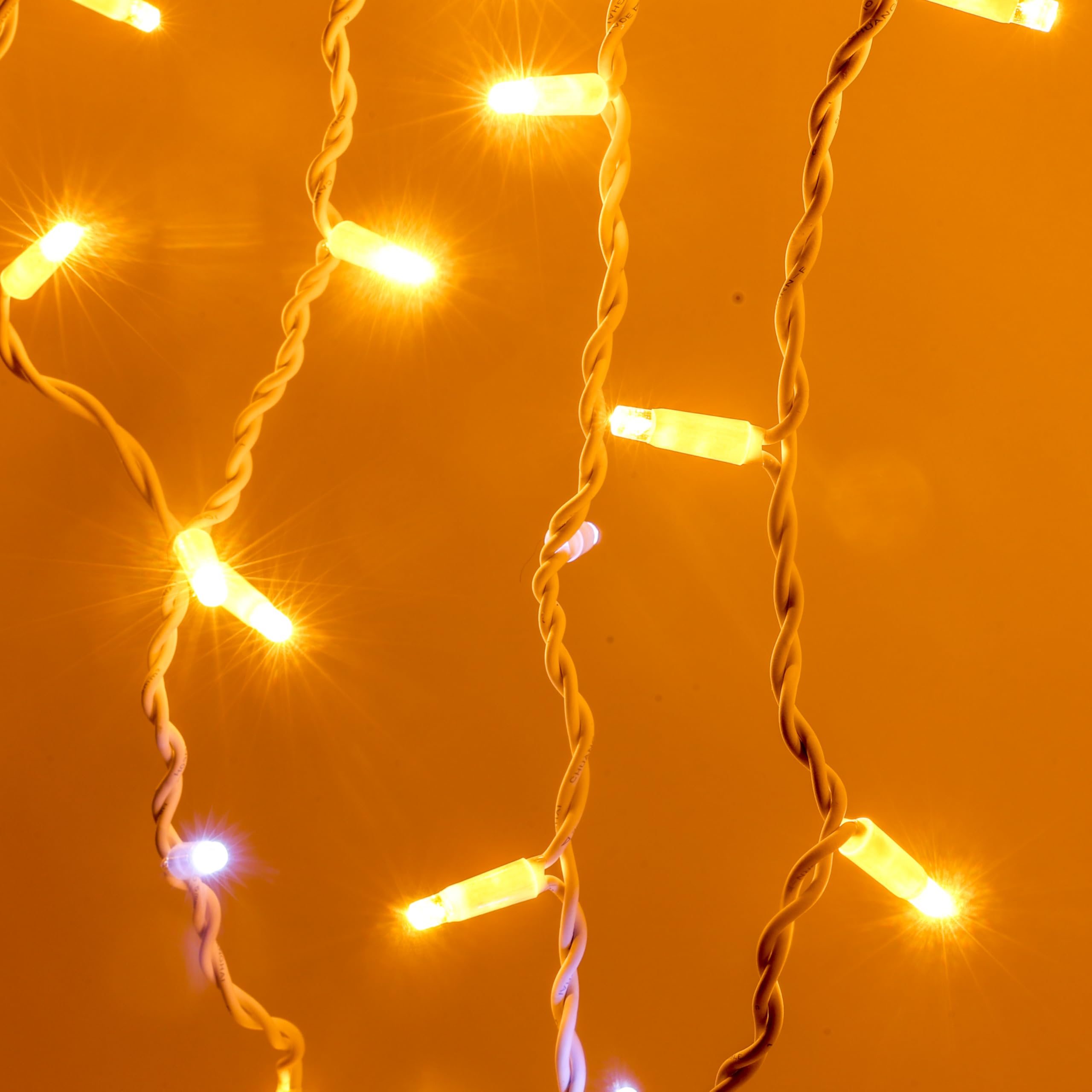 Luccika Cascata di Stalattiti Professionali, colore luci Oro Antico, 5 Metri con 380 Maxi LED da 8 mm, Flash Ghiaccio, Pendenti varie lunghezze fino ad 1 Metro, Prolungabile, per uso Interno/Esterno