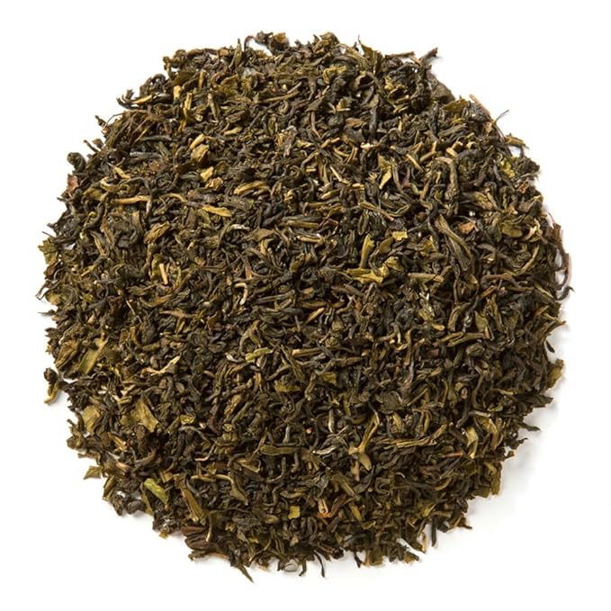 Davidson's Tea Bulk Imperial Green Tea is a high-quality green tea sourced from organic tea gardens. The 16-ounce bag contains loose leaf green tea that is carefully selected and processed to maintain its natural flavors and benefits. Green tea is known for its antioxidant properties and is believed to promote overall health and wellness.