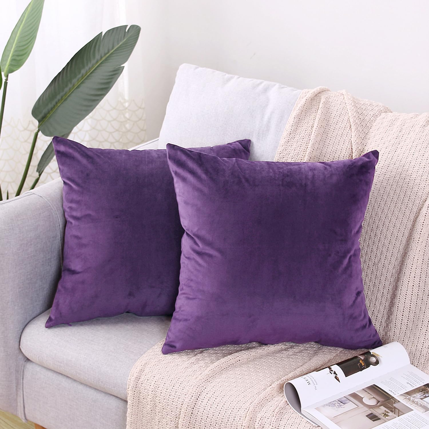 Set of two light purple velvet pillow covers that complement lavender bedding and decor.