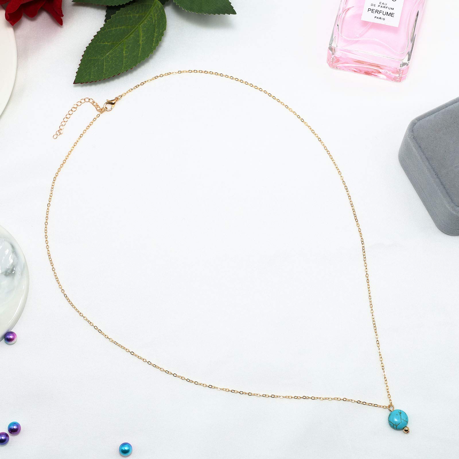 Collana in oro giallo con ciondolo di turchese e perle - Sari Gold