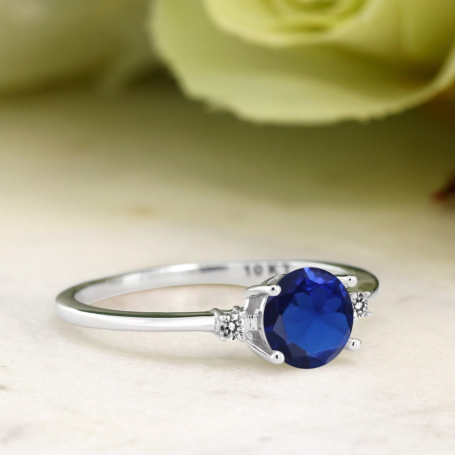 Gem Stone King 10K White Gold Blue Created Sapphire and White Diamond Solitaire Engagement Ring For Women (0.78 Cttw, Round 6MM, Gemstone September Birthstone)