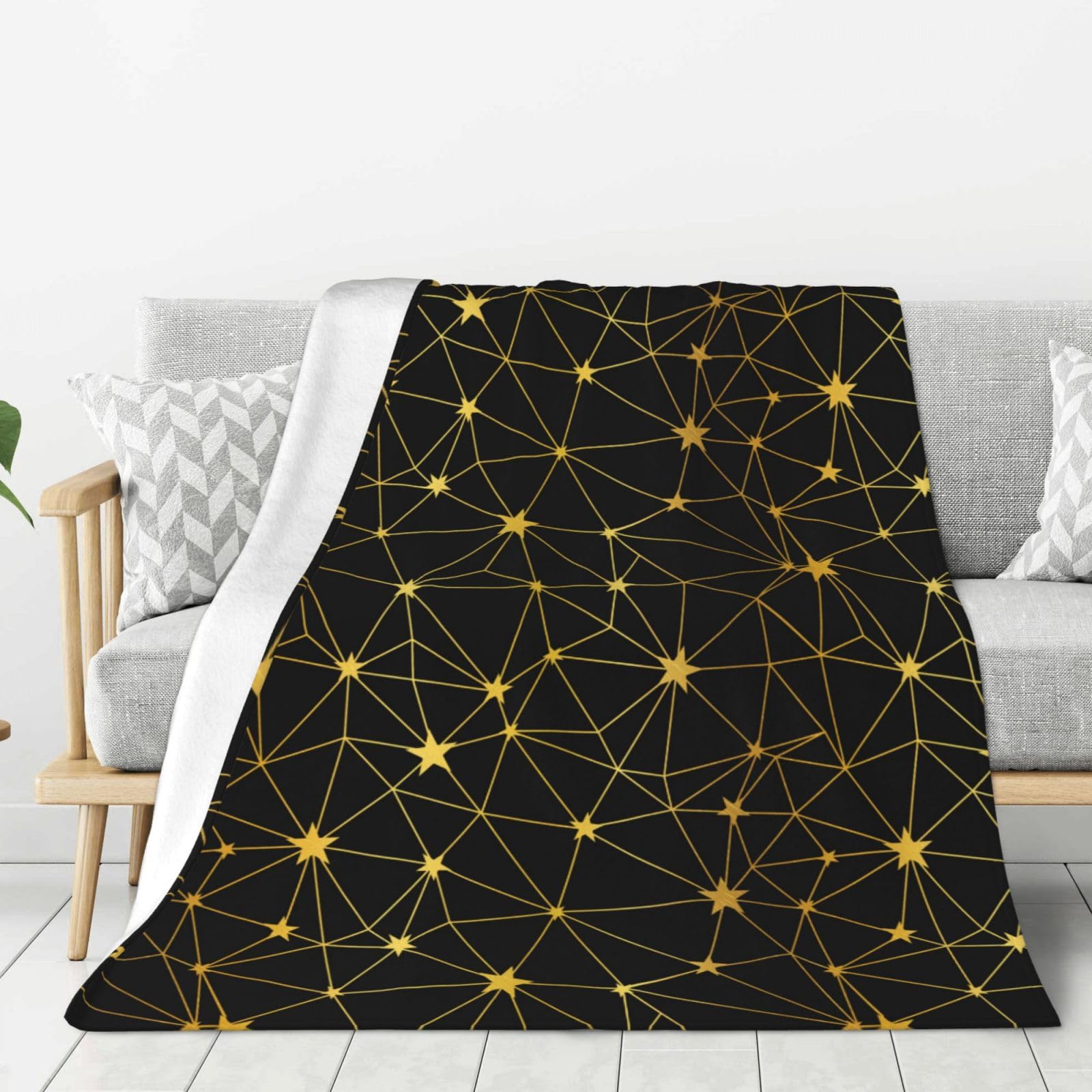 Couverture chaude pour voyage et canapé à motif étoiles noires et dorées
