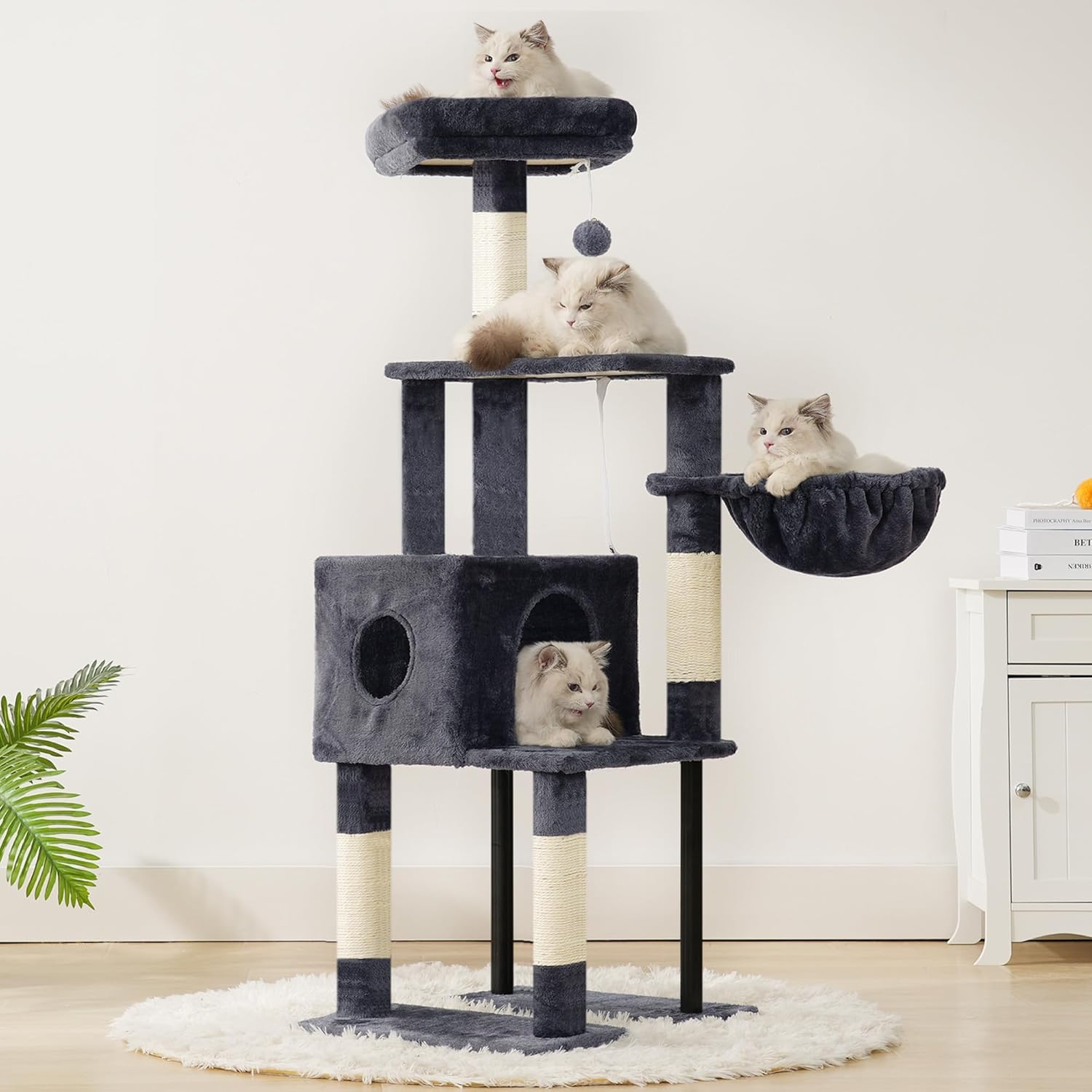 Close-up of the anti-tipping strap installation on the cat tree