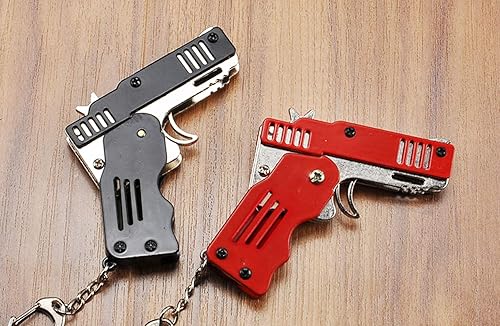 Miniatura 5 de 2 piezas de pistola de goma de juguete de fácil carga plegable hecha a mano pistola de juguete mini pistola de goma de metal con llavero y 200